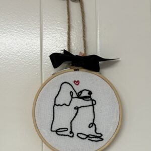 Broderie personne avec chien